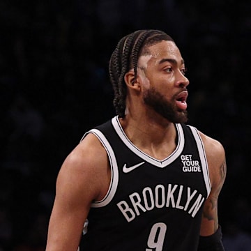 Apr 13, 2025; Brooklyn, New York, USA; Brooklyn Nets forward Trendon Watford (9) dribbles up court during the second half against the New York Knicks at Barclays Center. Mandatory Credit: Vincent Carchietta-Imagn Images