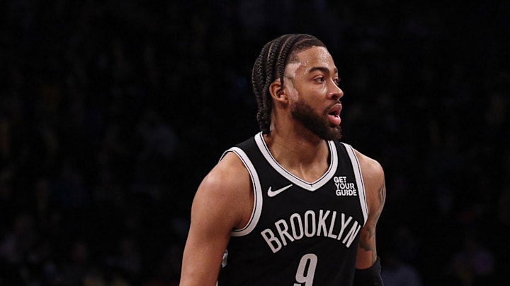 Apr 13, 2025; Brooklyn, New York, USA; Brooklyn Nets forward Trendon Watford (9) dribbles up court during the second half against the New York Knicks at Barclays Center. Mandatory Credit: Vincent Carchietta-Imagn Images