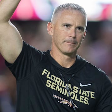 Florida State Seminoles head coach Mike Norvell walks down the field. The Miami Hurricanes lead the Florida State Seminoles 14-3 at the half on Saturday, Oct. 4, 2025.