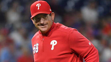 Philadelphia Phillies manager Rob Thomson (59) walks back to the dugout after making a pitching change against the New York Mets at Citizens Bank Park.