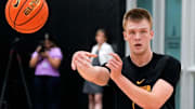 Iowa’s Bennett Stirtz (14) passes the ball during practice June 19, 2025 at Carver-Hawkeye Arena in Iowa City, Iowa.
