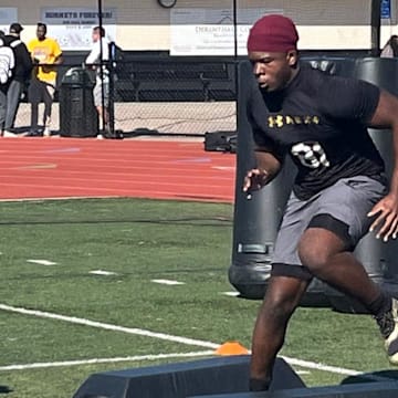 Cardinal Mooney defensive lineman Elijah Golden, shown going through in individual drills during the Under Armour Next camp, has committed to Notre Dame.