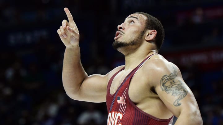 Aaron Brooks reacts after defeating Alex Dieringer 8-4 at the U.S. Olympic Wrestling Trials.