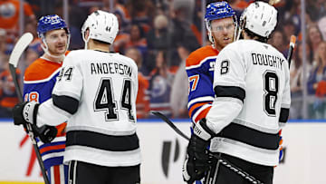 May 1, 2025; Edmonton, Alberta, CAN; Edmonton Oilers forward Connor McDavid (97) and forward Zach Hyman (18) shakes hands with Los Angeles Kings defensemen Mikey Anderson (44) and Los Angeles Kings defensemen Drew Doughty (8) after the Oilers eliminated the Kings in game six of the first round of the 2025 Stanley Cup Playoffs at Rogers Place. Mandatory Credit: Perry Nelson-Imagn Images