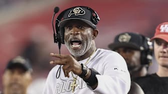 Sep 12, 2025; Houston, Texas, USA; Colorado Buffaloes head coach Deion Sanders reacts after a play during the third quarter against the Houston Cougars at TDECU Stadium.