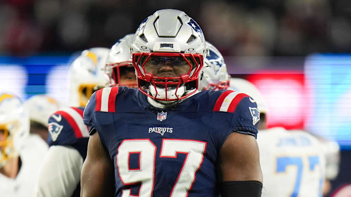 Jan 11, 2026; Foxborough, MA, USA; New England Patriots defensive end Milton Williams (97) celebrates a sack during the second quarter against the Los Angeles Chargers in an AFC Wild Card Round game at Gillette Stadium. Mandatory Credit: David Butler II-Imagn Images