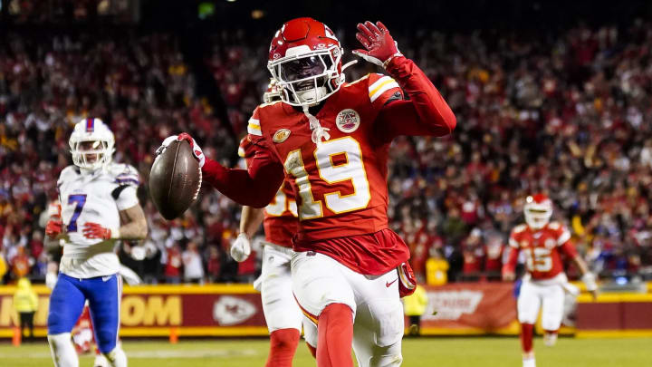 Dec 10, 2023; Kansas City, Missouri, USA; Kansas City Chiefs wide receiver Kadarius Toney (19) scores a touchdown during the second half against the Buffalo Bills at GEHA Field at Arrowhead Stadium. The play would be called back due to an offensive penalty. Mandatory Credit: Jay Biggerstaff-USA TODAY Sports