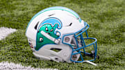 Dec 3, 2022; New Orleans, Louisiana, USA; Tulane Green Wave helmet on the field against the UCF Knights during the first half  at Yulman Stadium. 