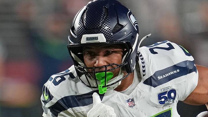 Seattle Seahawks running back Zach Charbonnet rushes the ball