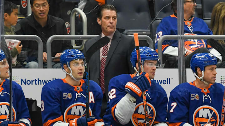 New York Islanders head coach Lane Lambert looks on against the New Jersey Devils. New York Islanders head coach Lane Lambert looks on against the New Jersey Devils.