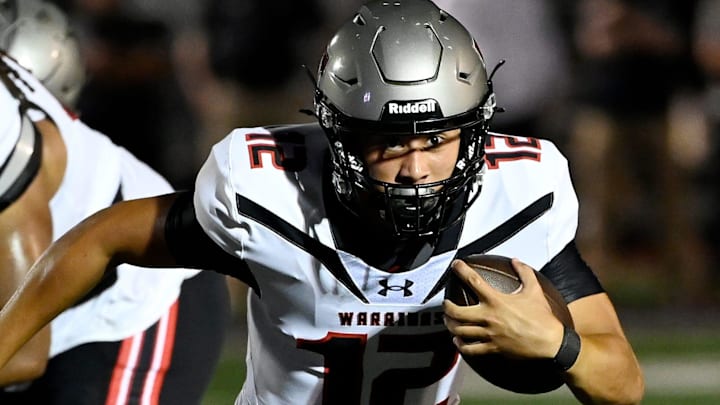 Thompson quarterback Trent Seaborn (12), a four-star junior, had a five-star performance after overcoming a deflected interception on the Warriors' first drive of the game.