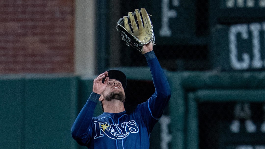 Tampa Bay Rays right fielder Josh Lowe (15) fields a fly ball against the San Francisco Giants during the seventh inning at Oracle Park. Tampa Bay Rays right fielder Josh Lowe (15) fields a fly ball against the San Francisco Giants during the seventh inning at Oracle Park.
