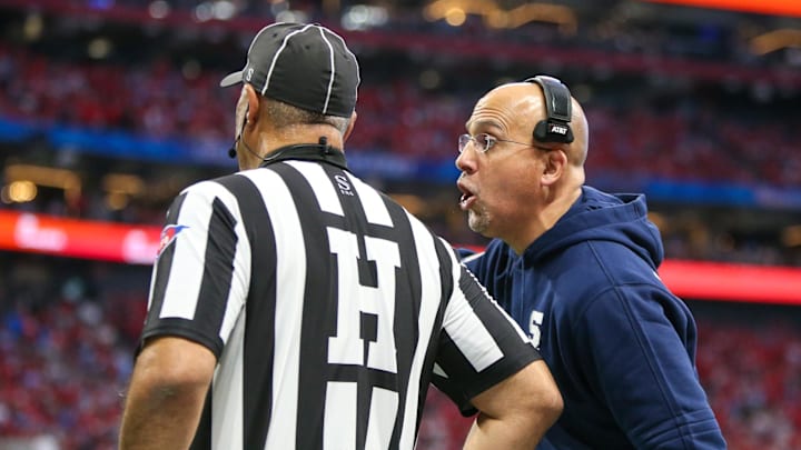 Dec 30, 2023; Atlanta, GA, USA; Penn State Nittany Lions head coach James Franklin talks to a