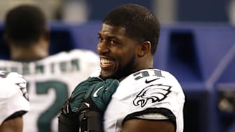 Nov 27, 2014; Arlington, TX, USA;  Philadelphia Eagles inside linebacker Emmanuel Acho (51) laughs on the sidelines during the game against the Dallas Cowboys at AT&T Stadium. Philadelphia beat Dallas 33-10. Mandatory Credit: Tim Heitman-Imagn Images