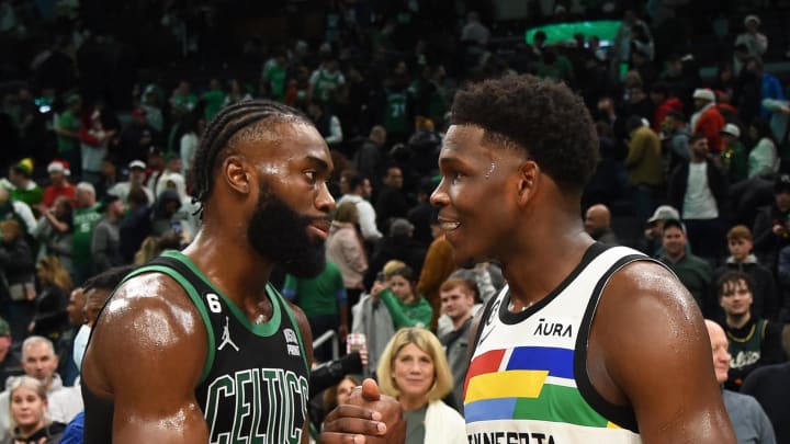 Dec 23, 2022; Boston, Massachusetts, USA;  Boston Celtics guard Jaylen Brown (7) and Minnesota Timberwolves guard Anthony Edwards (1) after the Celtics defeated the Timberwolves at TD Garden. Mandatory Credit: Bob DeChiara-USA TODAY Sports