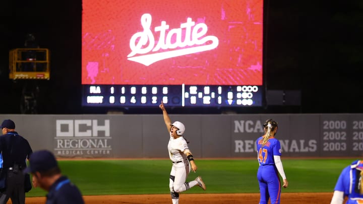 Mississippi State softball outfielder Paige Cook celebrates a home run against Florida.
