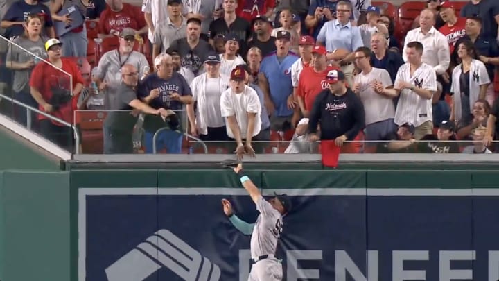 New York Yankees outfielder Aaron Judge robs a two-run home run against the Washington Nationals at Nationals Park. 