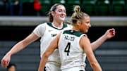Michigan State's Grace VanSlooten, left, and Theryn Hallock celebrate a score against Wayne State during the first quarter on Monday, Oct. 28, 2024, in East Lansing.