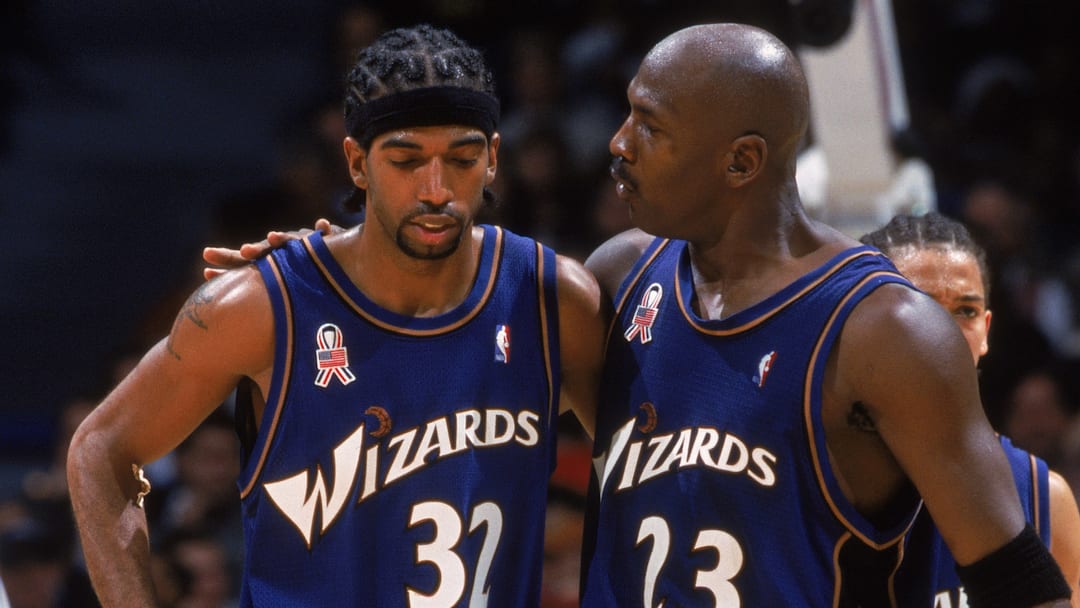 Richard Hamilton listens to Michael Jordan