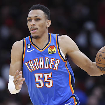 Feb 1, 2023; Houston, Texas, USA; Oklahoma City Thunder forward Darius Bazley (55) dribbles the ball during the fourth quarter against the Houston Rockets at Toyota Center. Mandatory Credit: Troy Taormina-Imagn Images