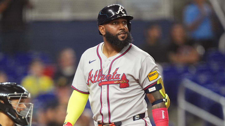 Aug 25, 2025; Miami, Florida, USA;  Atlanta Braves designated hitter Marcell Ozuna (20) strikes out looking in the ninth inning against the Miami Marlins at loanDepot Park. Mandatory Credit: Jim Rassol-Imagn Images