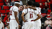 Dec 6, 2025; Raleigh, North Carolina, USA; NC State Wolfpack huddle with head coach Will Wade during the second half of the game against UNC Asheville Bulldogs at Lenovo Center. Mandatory Credit: Jaylynn Nash-Imagn Images