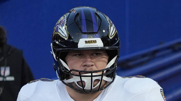 Sep 7, 2025; Orchard Park, New York, USA;  Baltimore Ravens center Tyler Linderbaum (64) and center Corey Bullock (67) enter the field for warm up prior to the game against the Buffalo Bills at Highmark Stadium. Mandatory Credit: Gregory Fisher-Imagn Images