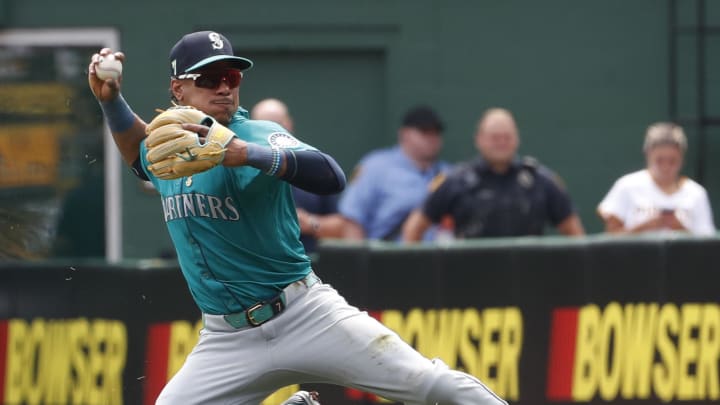 Seattle Mariners second baseman Jorge Polanco (7) throws from his knees to retire Pittsburgh Pirates designated hitter  Oneil Cruz (not pictured) during the first inning at PNC Park on Aug 17.