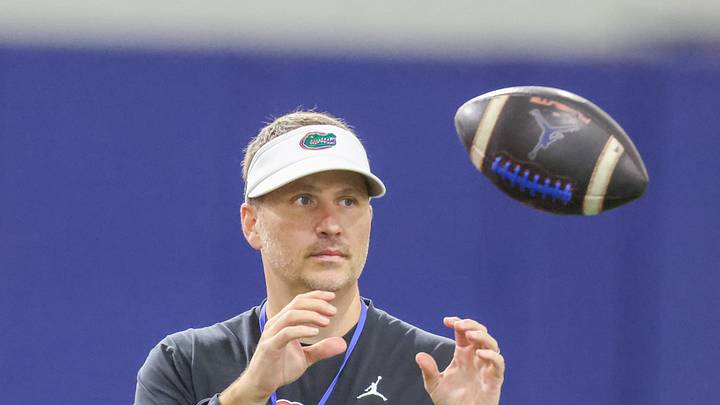 Florida offensive coordinator Buster Faulkner works out the quarterbacks during the first day of Florida Spring football practice at Heavener Football Center in Gainesville, FL on Tuesday, March 3, 2026. [Alan Youngblood/Gainesville Sun]