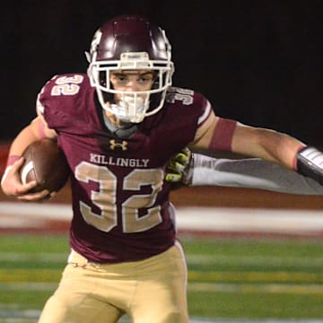 Hayden Allard (32) runs the ball for the Killingly varsity football team last season.