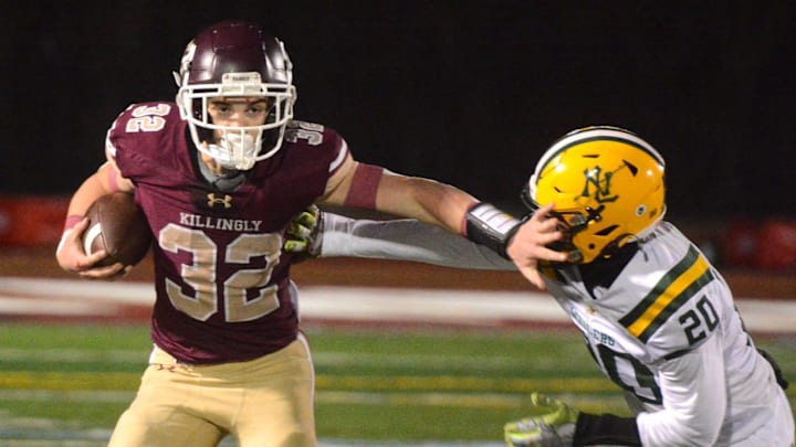 Hayden Allard (32) runs the ball for the Killingly varsity football team last season. Hayden Allard (32) runs the ball for the Killingly varsity football team last season.