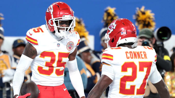 Sep 21, 2025; East Rutherford, New Jersey, USA; Kansas City Chiefs cornerback Jaylen Watson (35) celebrates with defensive back Chamarri Conner (27) after an interception in the second quarter at MetLife Stadium. Mandatory Credit: Vincent Carchietta-Imagn Images