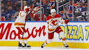 Oct 13, 2024; Edmonton, Alberta, CAN; The Calgary Flames celebrate a goal scored by forward Justin Kirkland (58) during the third period against the Edmonton Oilers at Rogers Place. Mandatory Credit: Perry Nelson-Imagn Images