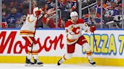 Oct 13, 2024; Edmonton, Alberta, CAN; The Calgary Flames celebrate a goal scored by forward Justin Kirkland (58) during the third period against the Edmonton Oilers at Rogers Place. Mandatory Credit: Perry Nelson-Imagn Images