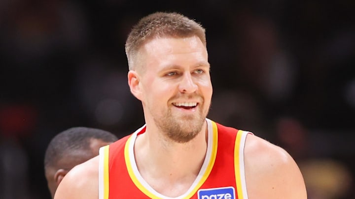 Atlanta Hawks center Kristaps Porzingis (8) reacts after a basket against the Denver Nuggets in the third quarter at State Farm Arena.