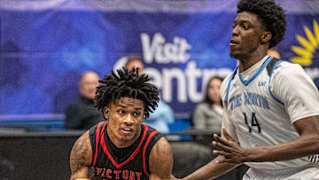 Victory Christian (1) Jozia Scott runs under basket by North Tampa Christian (14) Toni Bryant during the FHSAA 1A state semi final game at the RP Funding Center Tuesday February 25, 2025 in Lakeland Fl. Victory won 65-63 in 4 overtime periods.
Ernst Peters/The Ledger