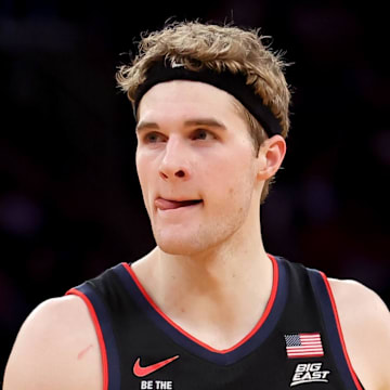 Mar 14, 2025; New York, NY, USA; Connecticut Huskies forward Liam McNeeley (30) during the first half against the Creighton Bluejays at Madison Square Garden. Mandatory Credit: Brad Penner-Imagn Images