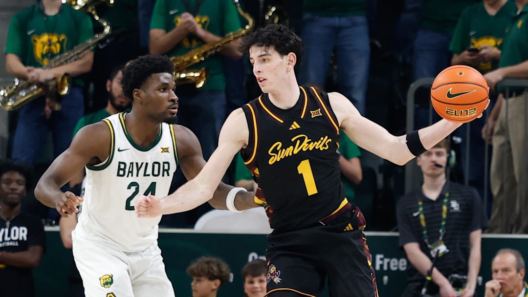 Feb 21, 2026; Waco, Texas, USA; Arizona State Sun Devils forward Santiago Trouet (1) controls the ball as Baylor Bears guard Tounde Yessoufou (24) defends during the second half at Paul and Alejandra Foster Pavilion. Mandatory Credit: Chris Jones-Imagn Images