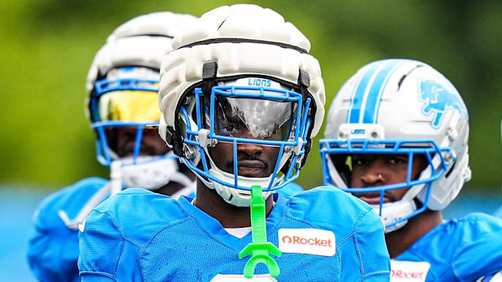 Detroit Lions cornerback Terrion Arnold (6) watches practice during training camp at team's Allen Park Performance Center