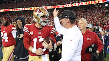 San Francisco 49ers quarterback Brock Purdy (L) and head coach Kyle Shanahan (R)