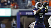 Sep 20, 2025; Charlottesville, Virginia, USA; Virginia Cavaliers linebacker Kam Robinson (5) celebrates after recovering a fumble by Stanford Cardinal quarterback Ben Gulbranson (not pictured) during the fourth quarter at Scott Stadium. Mandatory Credit: Geoff Burke-Imagn Images