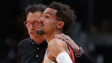 Atlanta Hawks head coach Quin Snyder and point guard Trae Young #11