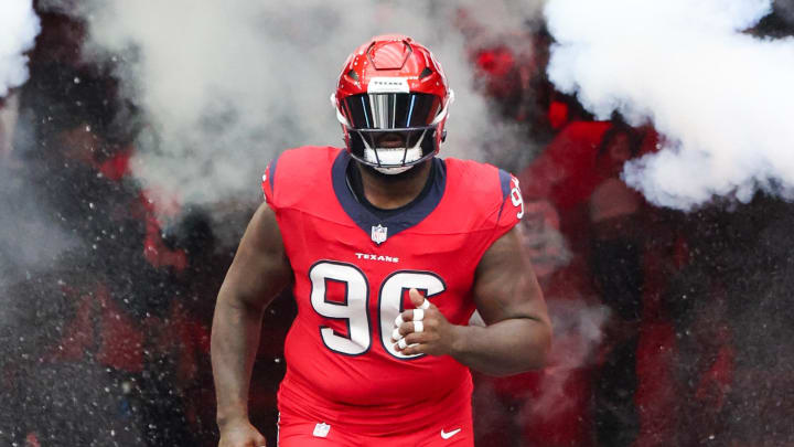 Nov 26, 2023; Houston, Texas, USA; Houston Texans defensive end Ali Gaye (90) is introduced before playing against the Jacksonville Jaguars at NRG Stadium. Mandatory Credit: Thomas Shea-USA TODAY Sports