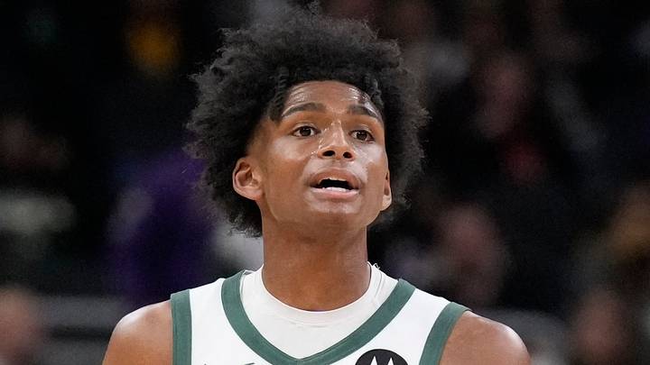 Milwaukee Bucks guard AJ Johnson (77) brings the ball up the court against the Los Angeles Lakers in the second half at Fiserv Forum on October 10, 2024.