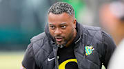 Oregon wide receivers coach Ross Douglas works with players during Oregon’s spring game on April 26, 2025, at Autzen Stadium in Eugene.