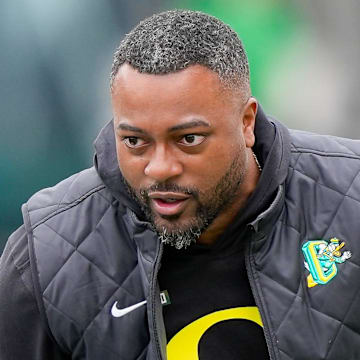 Oregon wide receivers coach Ross Douglas works with players during Oregon’s spring game on April 26, 2025, at Autzen Stadium in Eugene.