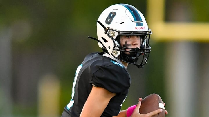 Jensen Beach quarterback Jonathan Ahern (8) gets ready to attempt a pass in a high school football game against South Fork on Monday, Oct. 16, 2023, in Jensen Beach.