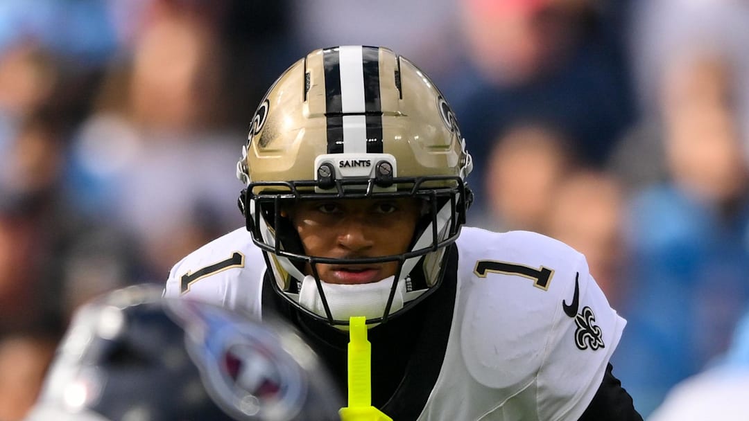 Dec 28, 2025; Nashville, Tennessee, USA;  New Orleans Saints cornerback Alontae Taylor (1) peaks into the backfield against the Tennessee Titans during the first half at Nissan Stadium. Mandatory Credit: Steve Roberts-Imagn Images