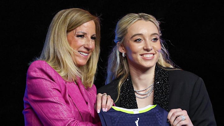 Paige Bueckers poses with Cathy Engelbert after being selected with the number one overall pick to the Dallas Wings. Paige Bueckers poses with Cathy Engelbert after being selected with the number one overall pick to the Dallas Wings.