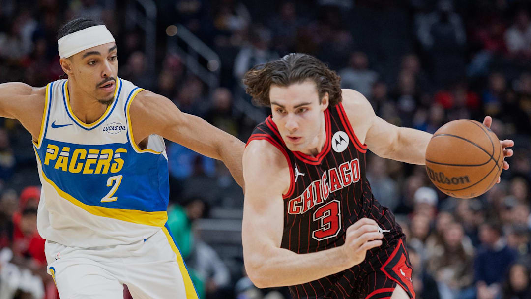 Nov 29, 2025; Indianapolis, Indiana, USA; Chicago Bulls guard Josh Giddey (3) drives with the ball against Indiana Pacers guard Andrew Nembhard (2) during the first half at Gainbridge Fieldhouse. Mandatory Credit: Trevor Ruszkowski-Imagn Images